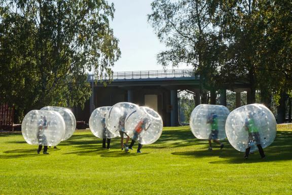 Contestants playing bubble football